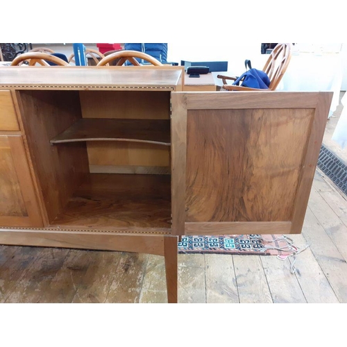 1237 - 1969/70 Oliver Morel Cotswold School walnut sideboard having slight raised edge to the back, central... 