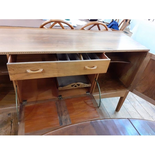 1237 - 1969/70 Oliver Morel Cotswold School walnut sideboard having slight raised edge to the back, central... 