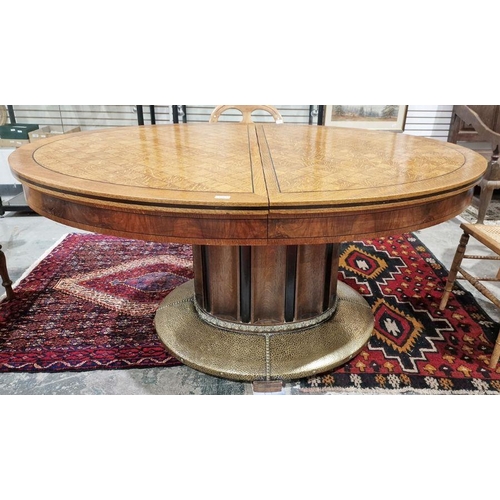 1262 - Austrian chequered oak oval dining table with ebony stringing, on oval curved panel column, hammered... 