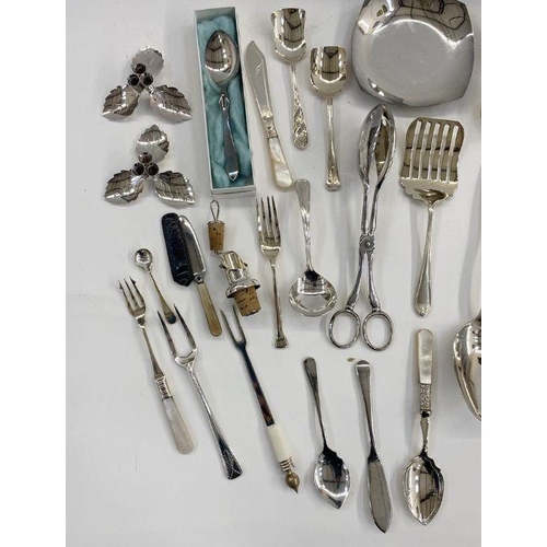 225 - Assorted silver-plated items to include cruet set, sugar tongs, sugar shaker, jam spoons, dessert sp... 