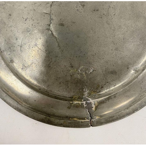 227 - Three pewter plates, a pair of candlestick holders and a sauce pot in the form of a milk churn (1 bo... 