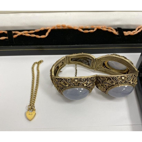 235 - Chinese silver-gilt bangle, a beaded purse, a 9ct gold small padlock chain bracelet, 2g approx. and ... 