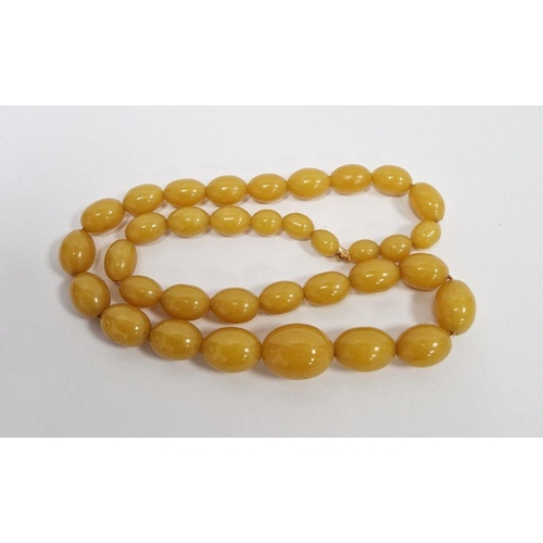 250 - String of butterscotch yellow graduated amber beads, 70cm long approx.