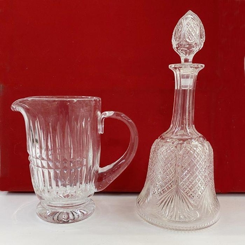 85 - Bell-shaped cut glass decanter, a facet-cut heavy water jug (slight chip inside), a cut glass rinser... 