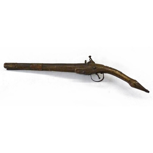 170 - Early 19th century Middle Eastern flintlock pistol, with ornately decorated handle and pommel, lengt... 