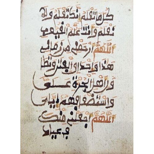 320 - Antique Quran - Arabic script in black and red, unbound but with signs of binding in the form of red... 