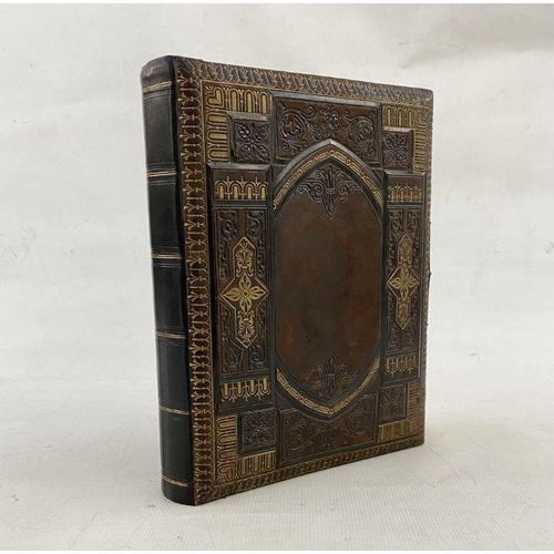 340 - Victorian photograph album music box, the pages printed with decorative chromolithograph floral spra... 