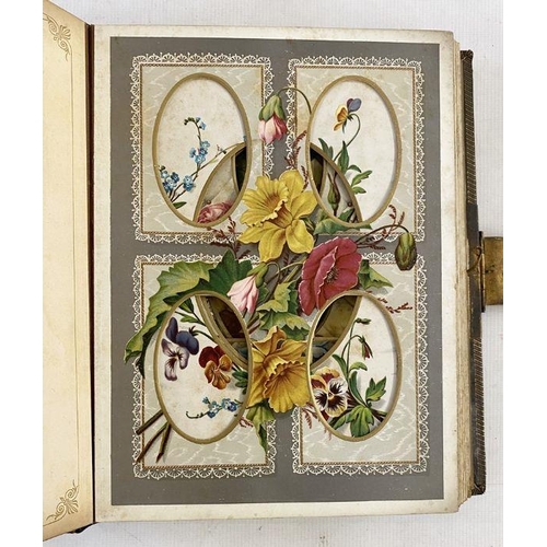 340 - Victorian photograph album music box, the pages printed with decorative chromolithograph floral spra... 