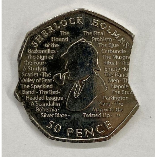 123 - Error 50p coin with notches on either edge, with letter of authenticity from the Royal Mint Museum