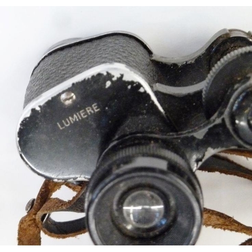 131 - Pair of French Lumiere, Paris binoculars, cased and a brass car horn (2)