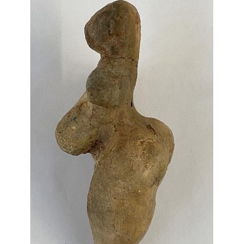 149 - Stone Age Venus idol with small cavity in the legs, 12cm x 6cm wide approx.