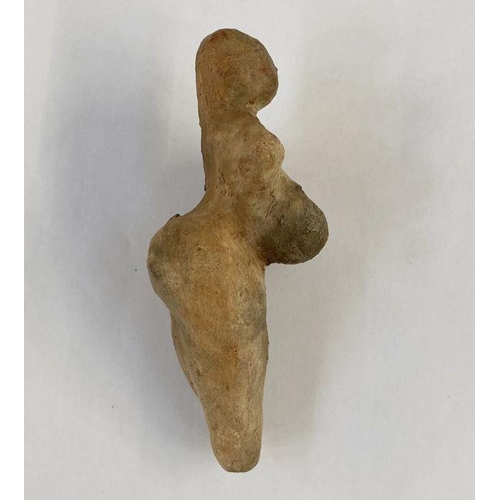 149 - Stone Age Venus idol with small cavity in the legs, 12cm x 6cm wide approx.