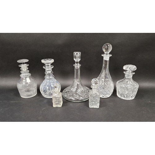 47 - Stuart cut glass decanter and six assorted clear glass decanters and bottles (7)