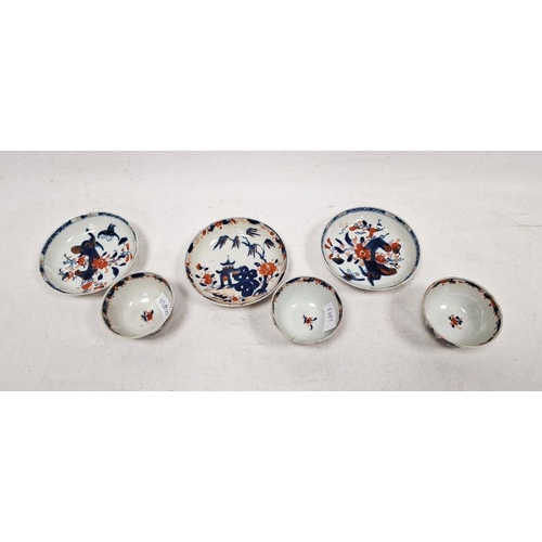 76 - Three matched Japanese Imari pattern tea bowls and saucers, each with decoration depicting pagodas a... 