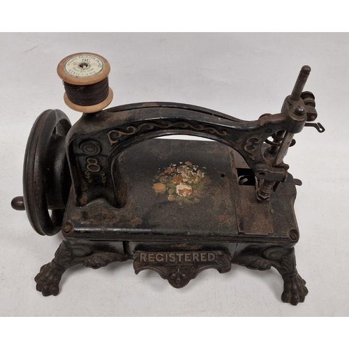 86 - Mid- to late 19th century 'American Registered' sewing machine on heavy cut iron base