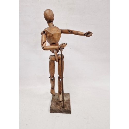 123 - Large wooden artist's mannequin, jointed , 69cm high