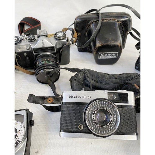 138 - Zenit EM camera, cased, a Contax 139 quartz camera with Yashica lens, a Canon Pellix camera, no.1695... 