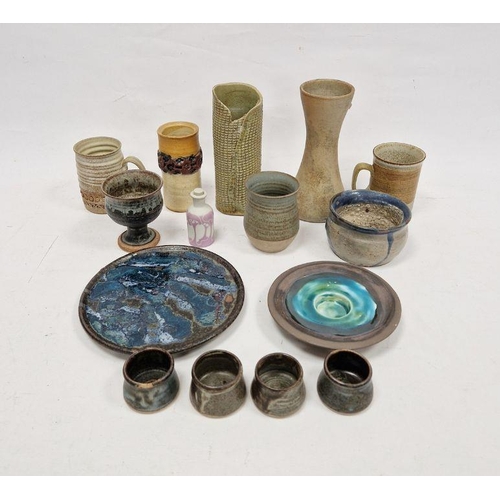 15 - Quantity of studio pottery to include candle holder, various mugs, vases, many marked to base, bowls... 