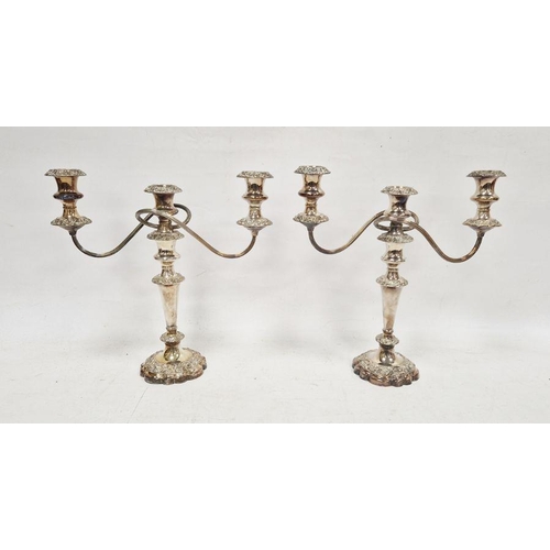 197 - Pair of silver-plated three-branch candelabra, each 35cm high approx. (2)