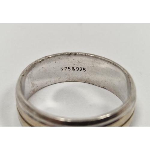 217 - 9ct gold and silver banded ring, line engraved, marked to the inside 375 and 925, 5.5g total