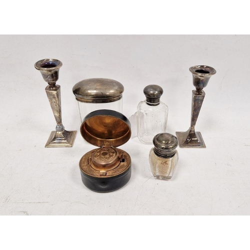 253 - Pair 1930s silver mounted candlesticks (one broken), tapering on a square base, Birmingham 1939, 12.... 