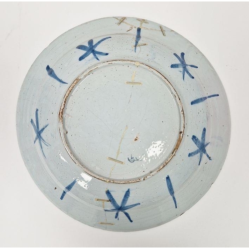 33 - 18th century blue and white delft charger with birds and foliage decoration, 34cm diameter