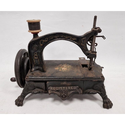 86 - Mid- to late 19th century 'American Registered' sewing machine on heavy cut iron base