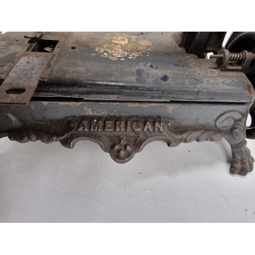 86 - Mid- to late 19th century 'American Registered' sewing machine on heavy cut iron base