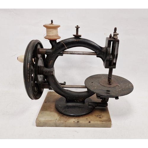 94 - Late 19th century 'Wanzer, Time Utilizer' sewing machine, no.136379, on marble base, 24cm high