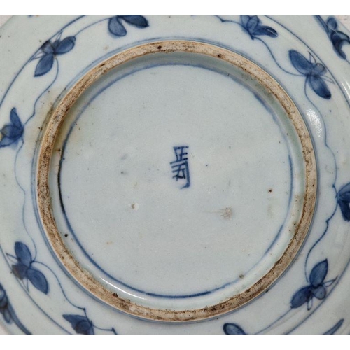 97 - Two Chinese porcelain blue and white small plates, 19th century, each painted with a stylised bird w... 