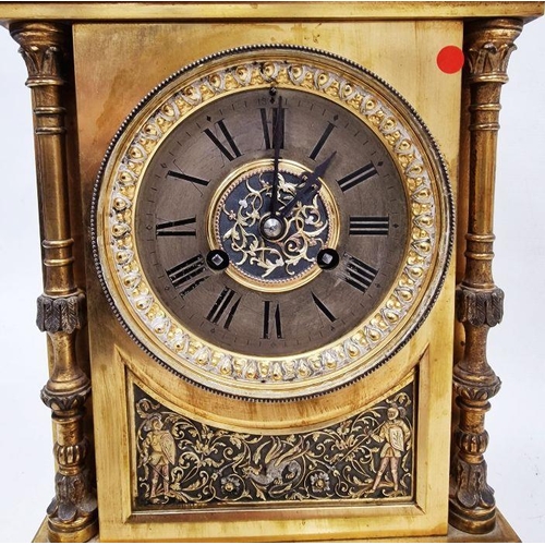 1002 - Moulded brass mantel clock of rectangular form with Gothic revival decoration, the dial with embosse... 