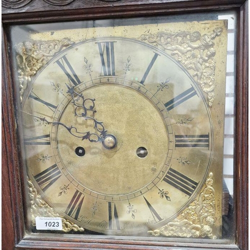 1023 - 19th century heavily carved oak cased eight-day longcase clock, the 11