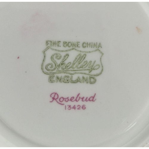 11 - Shelley 'Rosebud' part tea service comprising four teacups, six saucers, milk jug, sugar bowl, two-h... 