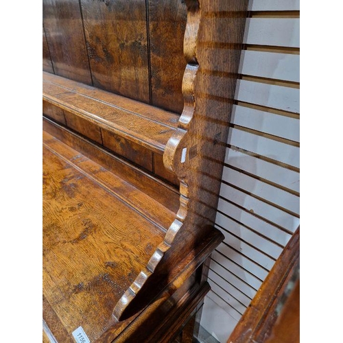 1156 - Reproduction inlaid oak dresser, the plate rack with scalloped frieze, the base banded with three fr... 