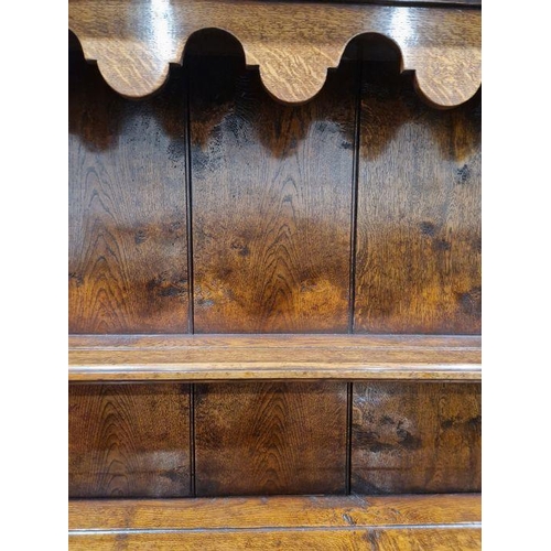 1156 - Reproduction inlaid oak dresser, the plate rack with scalloped frieze, the base banded with three fr... 