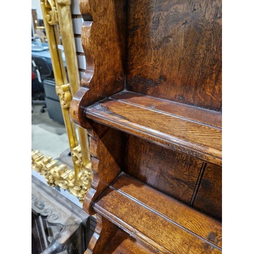 1156 - Reproduction inlaid oak dresser, the plate rack with scalloped frieze, the base banded with three fr... 