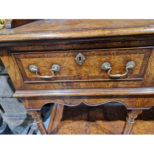 1156 - Reproduction inlaid oak dresser, the plate rack with scalloped frieze, the base banded with three fr... 