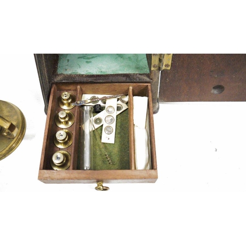 118 - Early 20th century brass microscope housed in original fitted wooden box, 26cm high fitted four addi... 