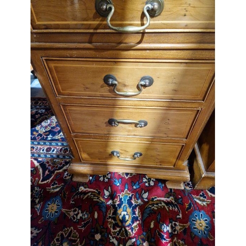 1183 - Modern walnut veneer partners' desk with green leather inset top, having one long drawer flanked by ... 