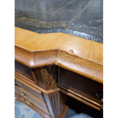 1183 - Modern walnut veneer partners' desk with green leather inset top, having one long drawer flanked by ... 