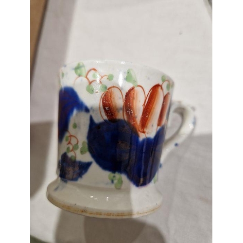 12 - Collection of English pottery and porcelain coffee cans and small mugs, circa 1810 and later, includ... 