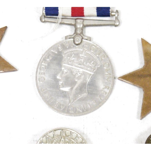 202 - WWII three piece medal group, comprising 1939 war medal, 1939-45 star and the France and Germany sta... 