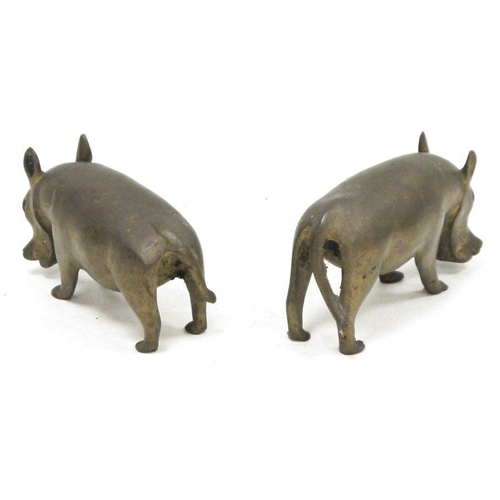 202A - Pair probably African patinated metal models of wart-hogs, 15.5 cm long