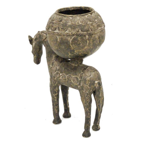 221 - Possibly North African cast metal model of a horse bearing a spherical pot, allover whorl embossed, ... 