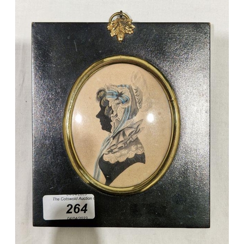 264 - 19th century silhouette portrait of a lady in period dress, framed and glazed, together with a white... 