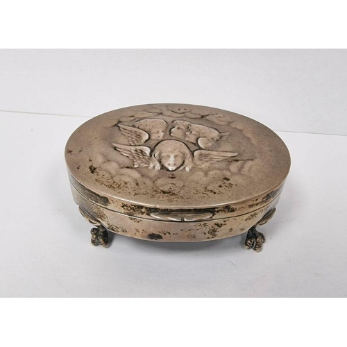 321 - Victorian silver-mounted oval jewellery box, repousse decorated with cherubs, on claw and ball feet,... 