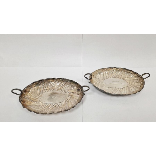 341 - Pair of Victorian silver two-handled oval dishes, leaf and scroll engraving, each on four bun feet, ... 