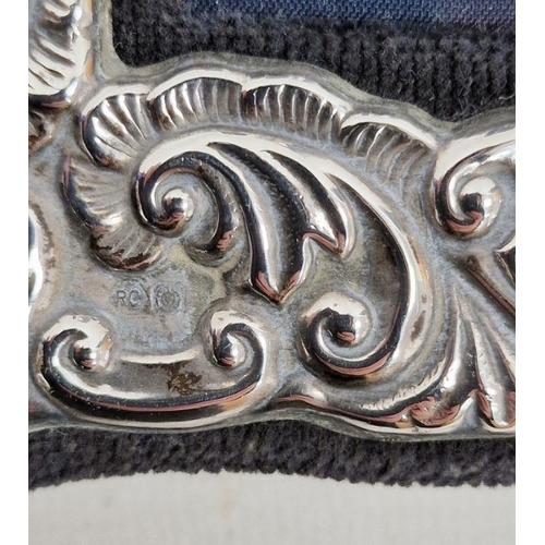 356 - Pair of 1980's silver-mounted picture frames, floral repousse decorated, Sheffield 1985, 19cm high x... 