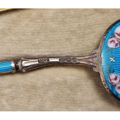 376 - Set of 12 silver-coloured and enamel teaspoons, various colours, floral decorated, 925, in fitted bo... 