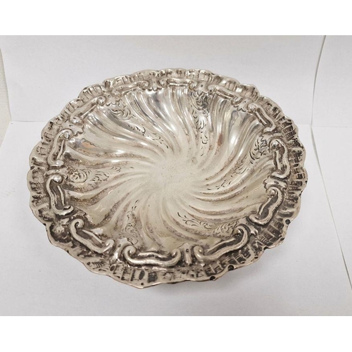 378 - Continental silver-coloured circular bowl, on three scroll feet, unmarked, 21cm in diameter, 5cm hig... 